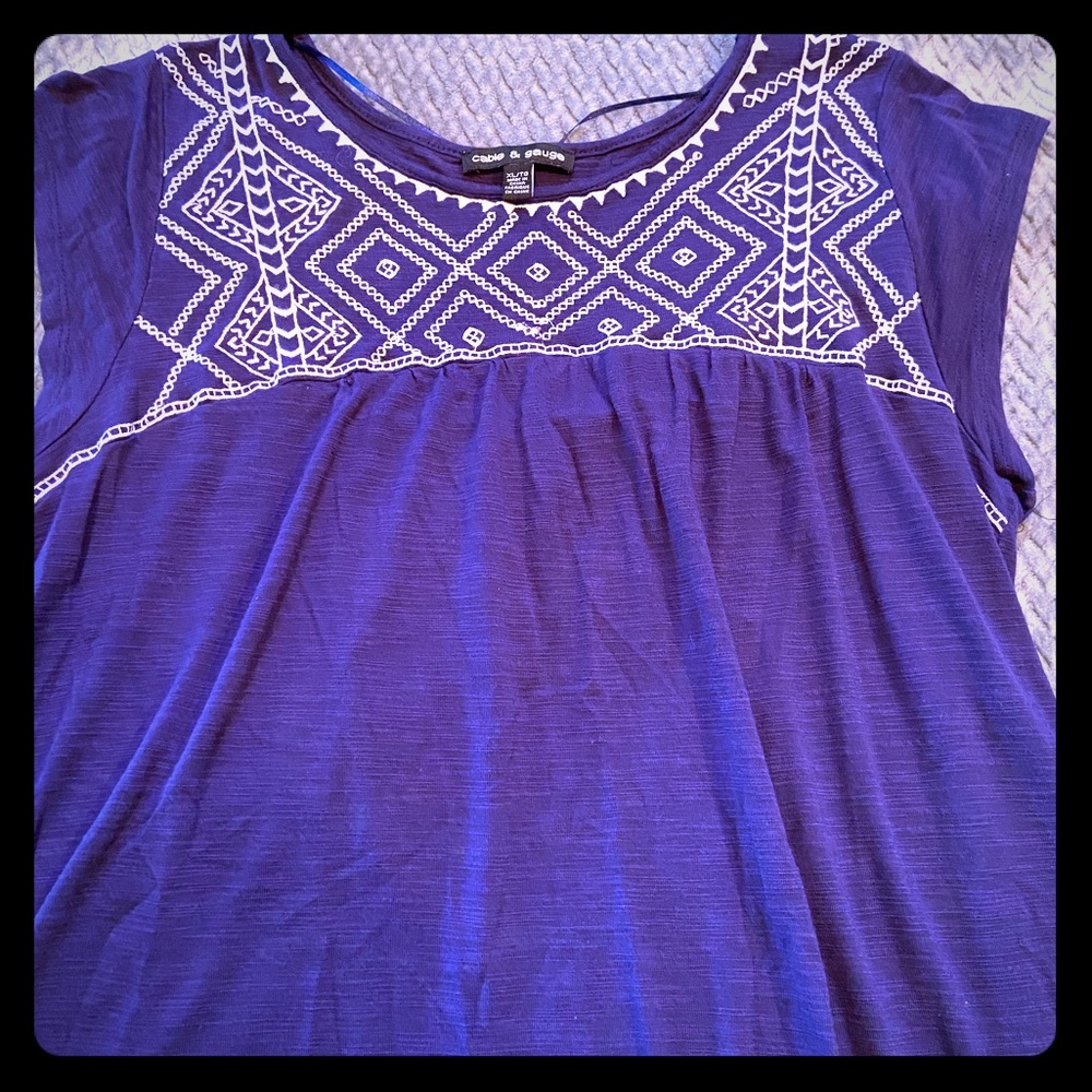 Woman’s navy & white detailed blouse